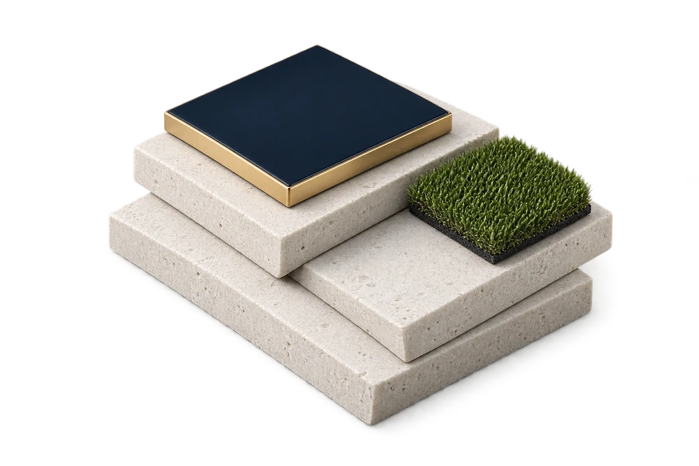 Sculptural study of pale stone pavers, navy enamel, gold edging, and turf